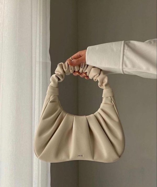 תיק יד בצבע שמנת